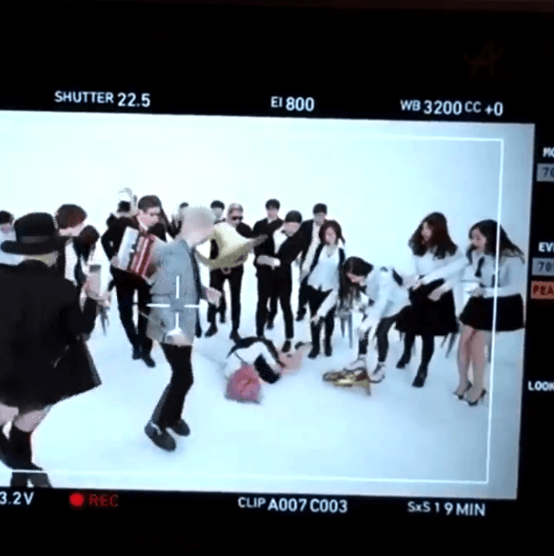 Min-takes-a-fall-on-Shake-That-Brass-MV-set2